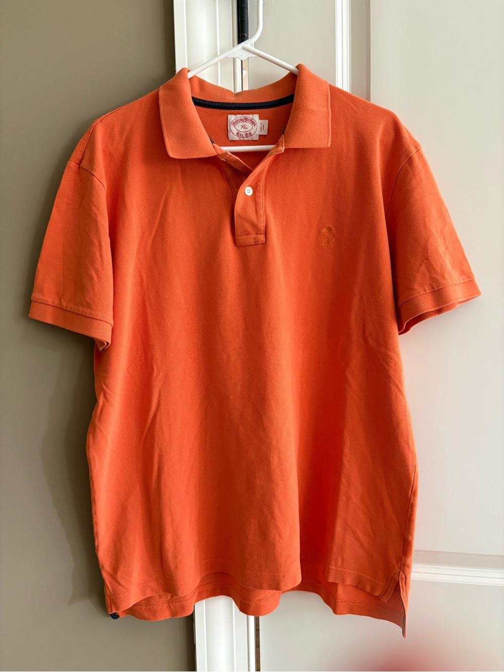 Brooks Brothers orange polo shirt